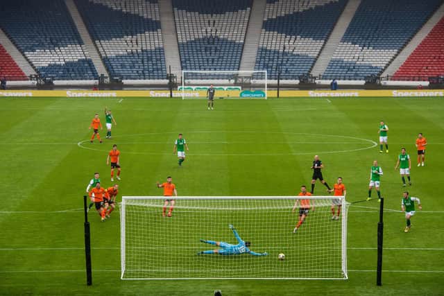 Both semi-finals, including Hibs' victory over Dundee United, were played in front of an empty Hampden Park. Picture: SNS