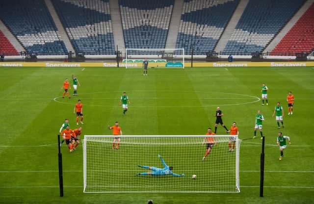 Both semi-finals, including Hibs' victory over Dundee United, were played in front of an empty Hampden Park. Picture: SNS