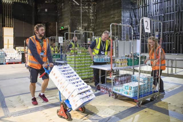 Members of The Highland Council pack thousands of food packages with supplies for Highlanders still shielding from the coronavirus pandemic