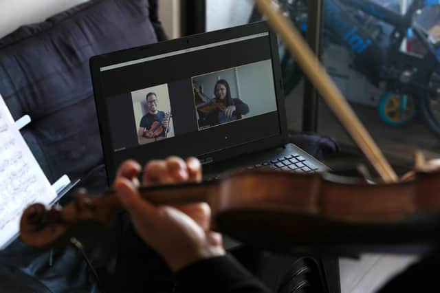 Online tuition can help people learn an instrument even when they live far away from a professional teacher (Picture: Marcelo Hernandez/Getty Images)