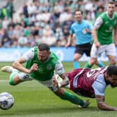 Hibs winger Martin Boyle goes down under pressure from Aston Villa's Douglas Luiz during the first leg at Easter Road.  (Photo by Craig Williamson / SNS Group)
