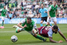 Hibs winger Martin Boyle goes down under pressure from Aston Villa's Douglas Luiz during the first leg at Easter Road.  (Photo by Craig Williamson / SNS Group)