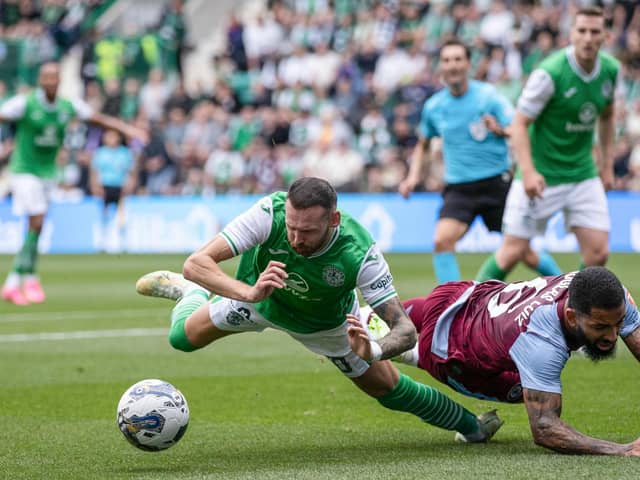 Hibs winger Martin Boyle goes down under pressure from Aston Villa's Douglas Luiz during the first leg at Easter Road.  (Photo by Craig Williamson / SNS Group)