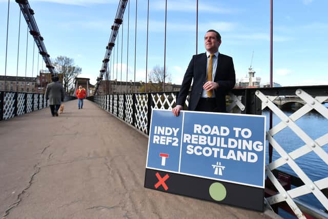 Scottish Conservative leader Douglas Ross launches a "Rebuilding Roadmap" and election pledge card.