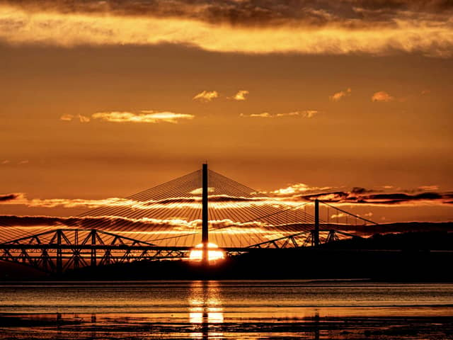 52 year-old Martin Brown captured the sun rising over the Queensferry Crossing, the Forth Road Bridge and the ‘iconic’ Forth Rail Bridge this morning (Photo: Martin Brown).