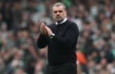 Celtic manager Ange Postecoglou applauds the fans during the 1-1 draw with Rangers.