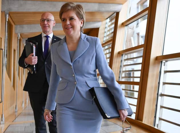 Nicola Sturgeon, seen with John Swinney in Holyrood, has announced the date of a proposed second referendum on Scottish independence (Picture: Jeff J Mitchell/Getty Images)