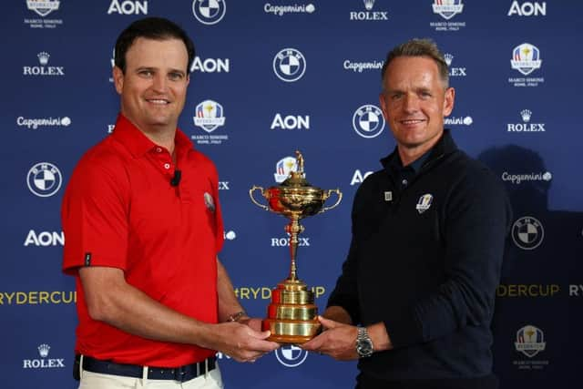 US captain Zach Johnson and European counterpart Luke Donald pose with the Ryder Cup during the 'Year to Go' celebrations in Rome earlier this week. Picture: Andrew Redington/Getty Images.