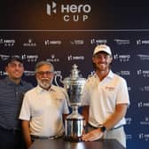 Francesco Molinari, captain of Continental Europe, and Tommy Fleetwood, captain of Great Britain and Ireland, pose with the Hero Cup along with Dr Pawan Munjal, chairman and CEO of Hero MotoCorp, at Abu Dhabi Golf Club. Picture: Andrew Redington/Getty Images.