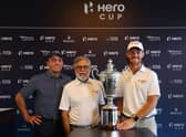 Francesco Molinari, captain of Continental Europe, and Tommy Fleetwood, captain of Great Britain and Ireland, pose with the Hero Cup along with Dr Pawan Munjal, chairman and CEO of Hero MotoCorp, at Abu Dhabi Golf Club. Picture: Andrew Redington/Getty Images.