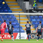 St Johnstone's Ali McCann blasts a penalty over the bar against Ross County.
