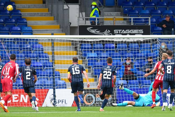 St Johnstone's Ali McCann blasts a penalty over the bar against Ross County.