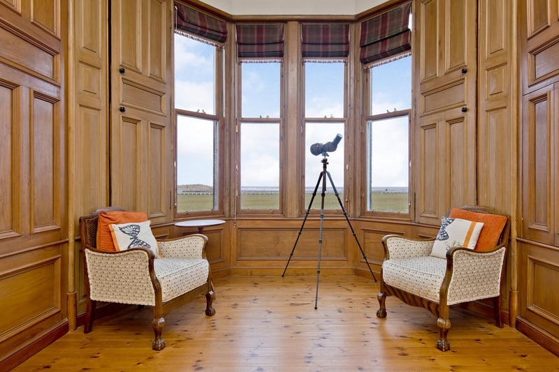 The living room with a stunning bay window offering some of the best views in Fife, if not Scotland.
