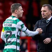 Celtic's Callum McGregor shakes hands with Brendan Rodgers after the 1-1 draw with Aberdeen.