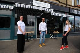 Antonio's Deli staff Alina Ionescu, Andrea Risiglione and Natalia Bator are preparing to reopen the Falkirk shop on Thursday, when customers will be able to settle their bill using cryptocurrency. Picture: Michael Gillen.