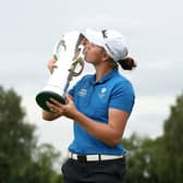 Hannah Darling kisses the trophy after her win in the R&A Girls' Amateur Championship at Fulford. Picture: Jan Kruger/R&A/R&A via Getty Images.