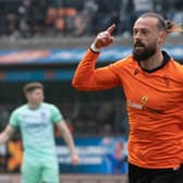 Dundee United's Steven Fletcher celebrates after making it 1-0 against Hibs.