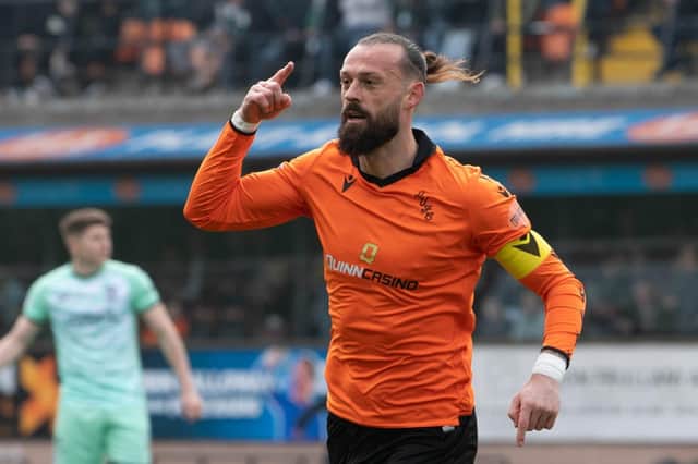 Dundee United's Steven Fletcher celebrates after making it 1-0 against Hibs.