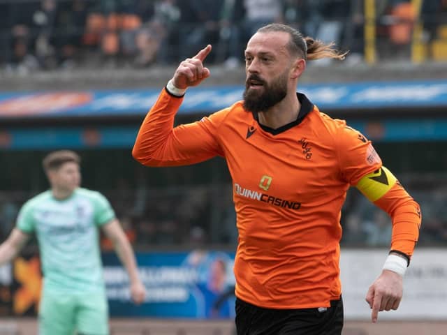 Dundee United's Steven Fletcher celebrates after making it 1-0 against Hibs.