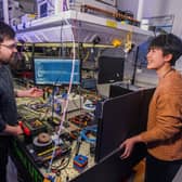 Heriot-Watt PhD students Arran Sykes and Harmony Li in conversation regarding a quantum sensing system. Picture: Chris Watt Photography/Heriot-Watt University