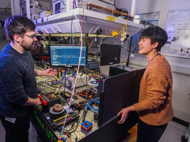 Heriot-Watt PhD students Arran Sykes and Harmony Li in conversation regarding a quantum sensing system. Picture: Chris Watt Photography/Heriot-Watt University