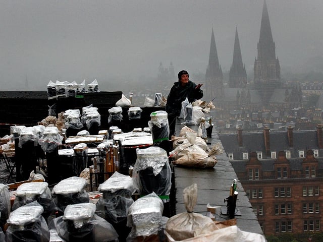 Wilf Scott, the Director of Pyrovision Ltd, making the final preparations for the fireworks in 2002.