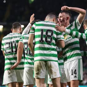 Celtic players celebrate Tom Rogic making it 1-0 against Motherwell.