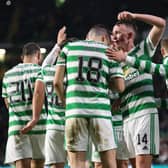 Celtic players celebrate Tom Rogic making it 1-0 against Motherwell.