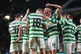 Celtic players celebrate Tom Rogic making it 1-0 against Motherwell.