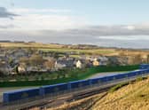 A new rail freight depot has been set up at Highland Spring's Perthshire water bottling plant which will see much of the firm's deliveries travelling by rail instead of road -- cutting 8,000 trips by lorry and 3,200 tonnes of carbon emissions each year