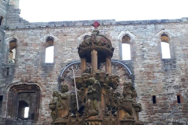 Red spraypaint was used to deface the top of the James V fountain, which sits in the central courtyard of the palace. PIC: HES.