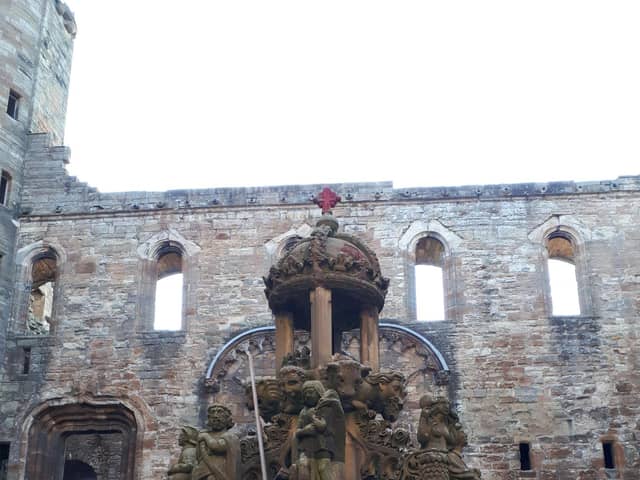 Red spraypaint was used to deface the top of the James V fountain, which sits in the central courtyard of the palace. PIC: HES.