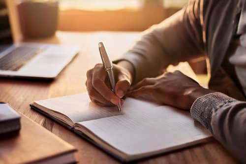 New research shows that writing by hand rather than using the keyboard actually helps boost learning and memory. Photo: StockAdobe