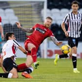 St Mirren midfielder Alan Power (centre) made an impressivd debut for the Paisley side in their 1-0 Premier Sports Cup win over Dunfermline. (Photo by Alan Harvey / SNS Group)