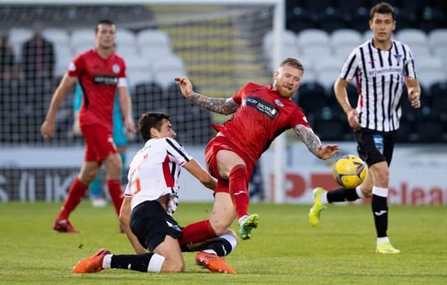 St Mirren midfielder Alan Power (centre) made an impressivd debut for the Paisley side in their 1-0 Premier Sports Cup win over Dunfermline. (Photo by Alan Harvey / SNS Group)
