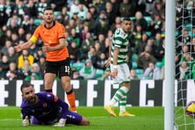 Dundee United goalkeeper Mark Birighitti can only watch as Sead Haksabanovic's shot creeps over the line in the 4-2 defeat to Celtic.  (Photo by Craig Foy / SNS Group)