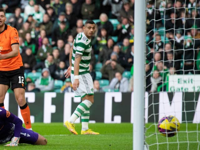 Dundee United goalkeeper Mark Birighitti can only watch as Sead Haksabanovic's shot creeps over the line in the 4-2 defeat to Celtic.  (Photo by Craig Foy / SNS Group)