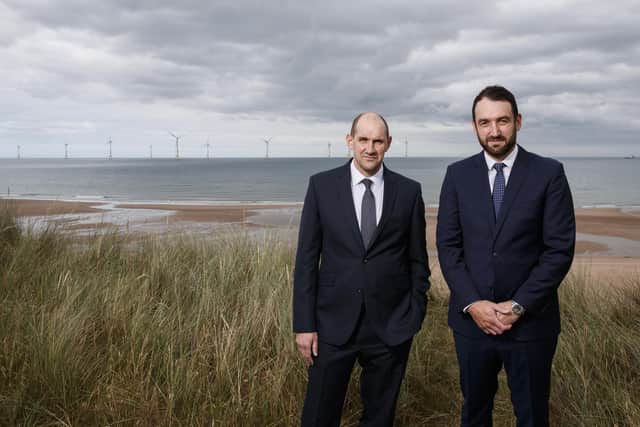 From left: Mark Davidson and Thomas Barter of PD&MS in front of Vattenfall’s European Offshore Wind Deployment Centre off the coast of Aberdeen. Picture: Ross Johnston/Newsline Media.
