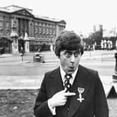 Mike Yarwood joking around outside Buckingham Palace after receiving his investiture from Queen Elizabeth II in 1976 (Picture: Monti Spry/Central Press/Getty Images)
