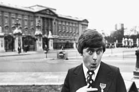 Mike Yarwood joking around outside Buckingham Palace after receiving his investiture from Queen Elizabeth II in 1976 (Picture: Monti Spry/Central Press/Getty Images)