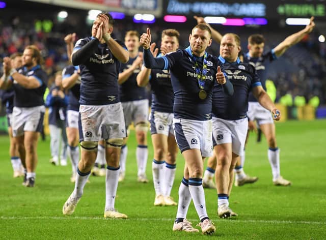 Man of the match Finn Russell celebrates Scotland's victory over Wales and a hat-trick of dazzling set-ups