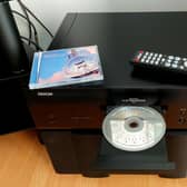 A decent compact disc player is the perfect way to listen to Dire Straits' 80s classic Brothers in Arms. Picture: Scott Reid