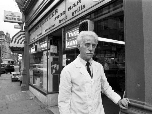 Owner Alfred de Angelis outside the Globetrotter fish and chip shop in Bruntsfield Edinburgh, December 1988.