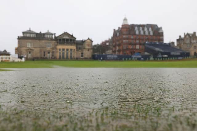 A view of the flooded first hole fairway in front of The Royal and Ancient Clubhouse at St Andrews on Sunday. Picture: Stephen Pond/Getty Images.