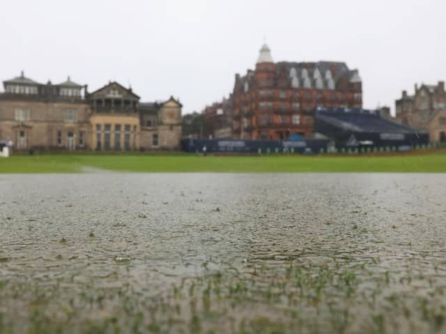 A view of the flooded first hole fairway in front of The Royal and Ancient Clubhouse at St Andrews on Sunday. Picture: Stephen Pond/Getty Images.