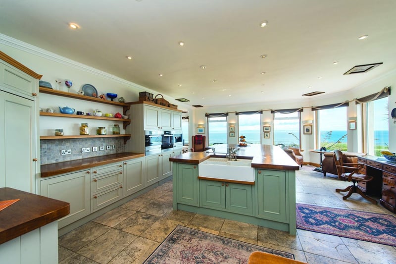 The current owner says: “It needed renovation and my partner saw the opportunity to add to the floor plan while reorienting the house to face the sea and the views.”
