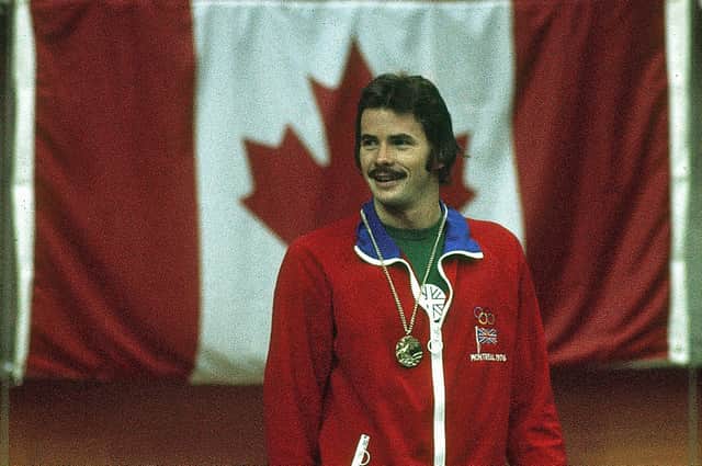 David Wilkie on the podium in Montreal after winning gold in the breaststroke during the 1976 Olympic Games. Picture: Tony Duffy/Allsport/Getty Images