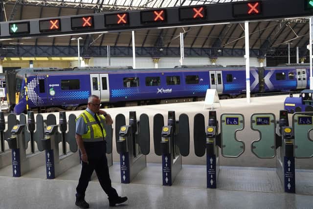 Ticket barriers at an empty Glasgow Queen Street station