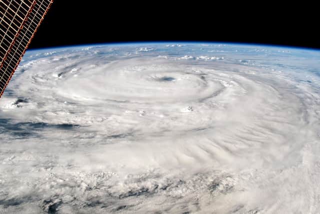 Global warming is increasing the power and destructive force of hurricanes and other storms (Picture: Nasa via Getty Images)