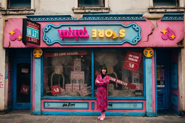 Artist Rachel Maclean has unveiled a pop-up installation in a vacant shop unit on Perth High Street.